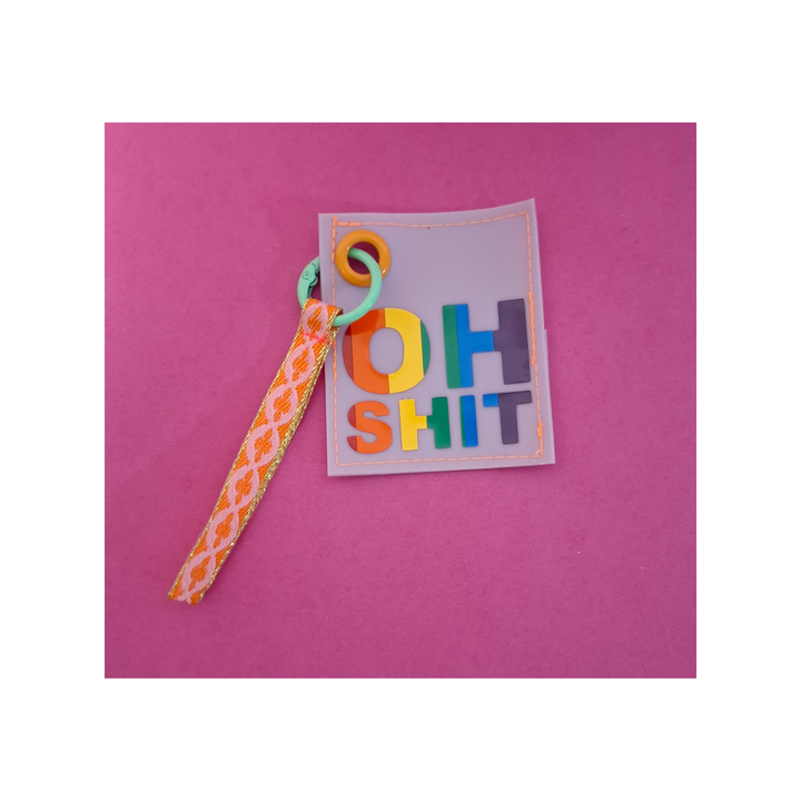 Handgemachter Hundesäckli-Beutel mit buntem «OH SHIT»-Aufdruck und gemustertem Spruchband, Pride Sonderedition von Rain4Flowers