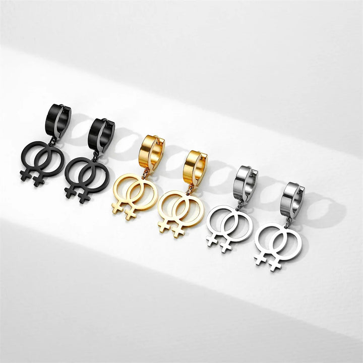 Lesbische Creolen mit Doppel-Venus-Symbol in Schwarz, Gold und Silber als LGBTQ+ Pride Ohrringe.