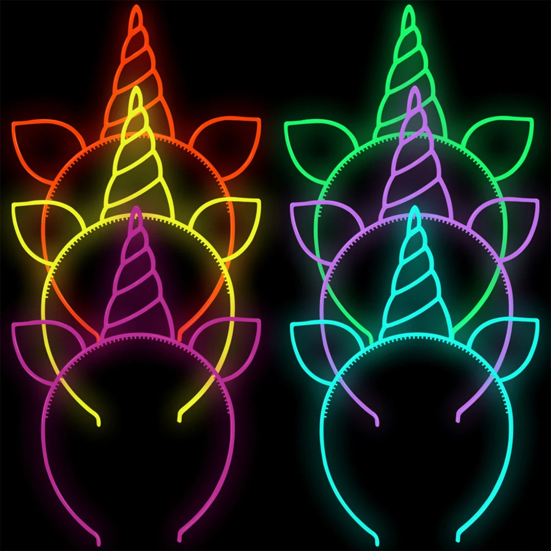 Leuchtende Einhorn-Haarreifen mit Ohren und Horn im Neon-Design in mehreren Farben vor schwarzem Hintergrund.