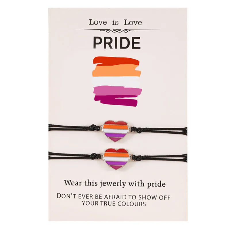 Pride Partnerarmband Set mit zwei Herz-Armbändern in den Farben der lesbischen Pride-Flagge – Symbol für Liebe, Zusammenhalt und Stolz.
