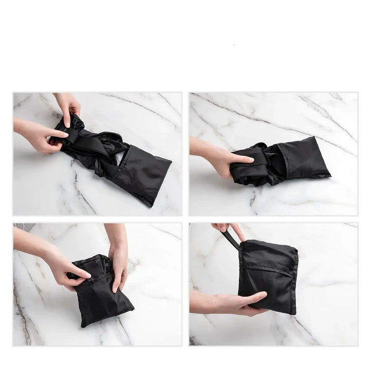 Faltbarer schwarzer Pride Crossbody-Rucksack, kompakt zusammengelegt in mehreren Schritten, platzsparend für unterwegs