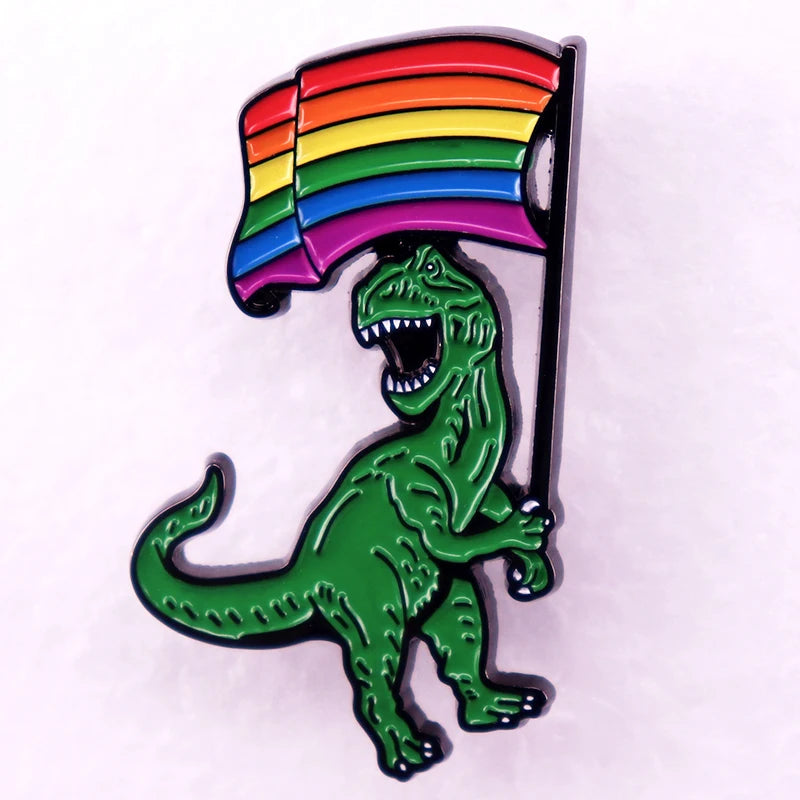 Queer T-Rex Pin – Regenbogen Emaille Pin mit Dinosaurier
