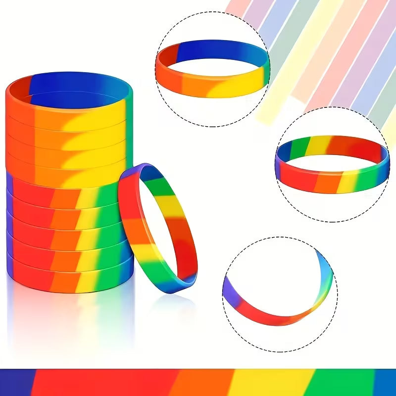 Set aus bunten Rainbow-Pride-Armbändern aus Silikon in kräftigen Regenbogenfarben.