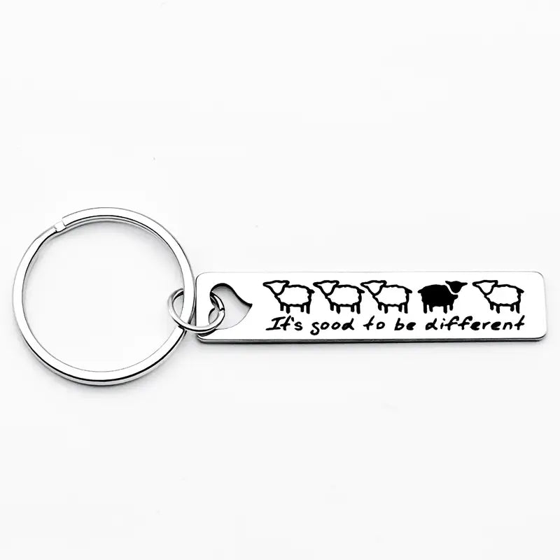Schlüsselanhänger aus Metall mit Schaf-Motiv und Schriftzug „It’s good to be different“, Symbol für Individualität