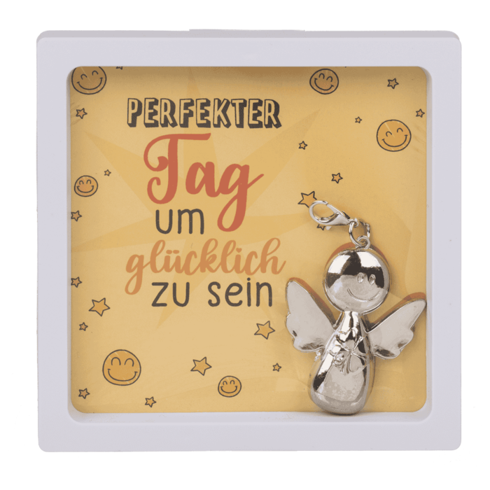 Schutzengel-Schlüsselanhänger aus Metall in weißer Geschenkbox mit gelber Karte und dem Spruch ‚Perfekter Tag um glücklich zu sein‘