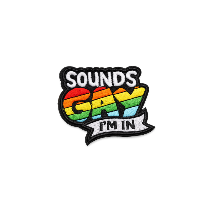 LGBTQIA+ Pride Patch mit Regenbogenfarben und Schriftzug Sounds Gay I’m In mit Klettverschluss